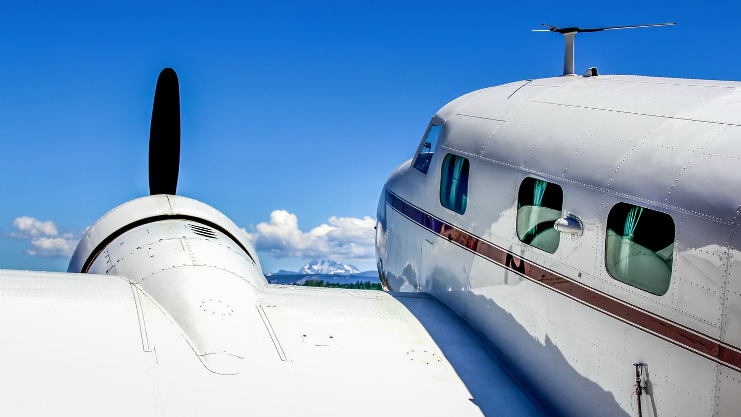 "Clouds Ahead" - Twin Beechcraft Model 18